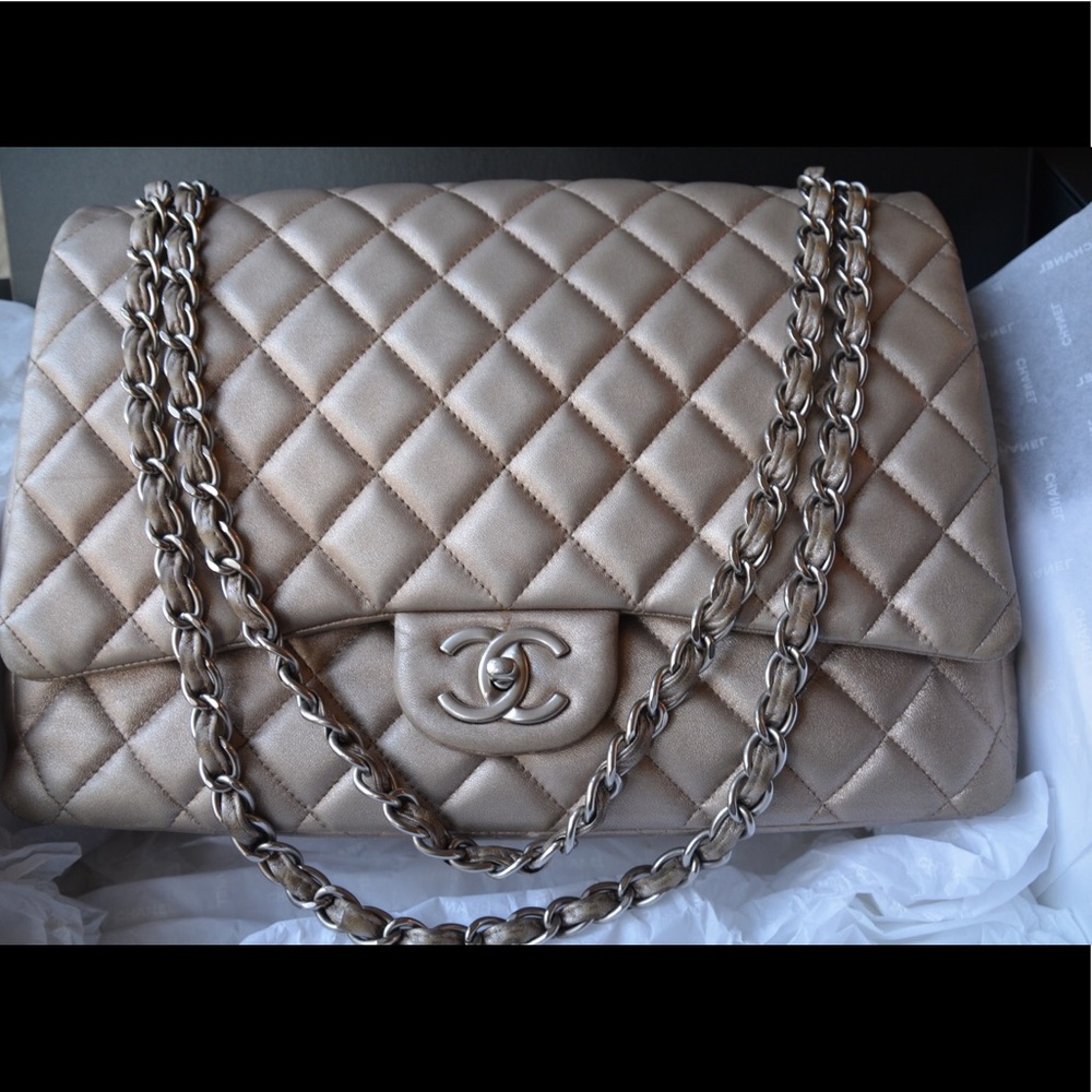 CHANEL Maxi bronze double flap bag